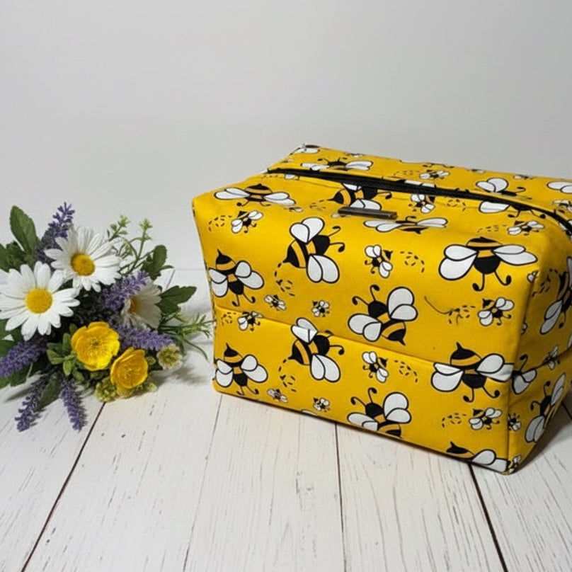 Yellow cosmetic bag with bee pattern 
