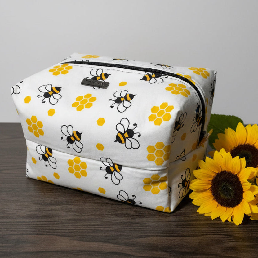 Rectangular pouch with bee and flower pattern 