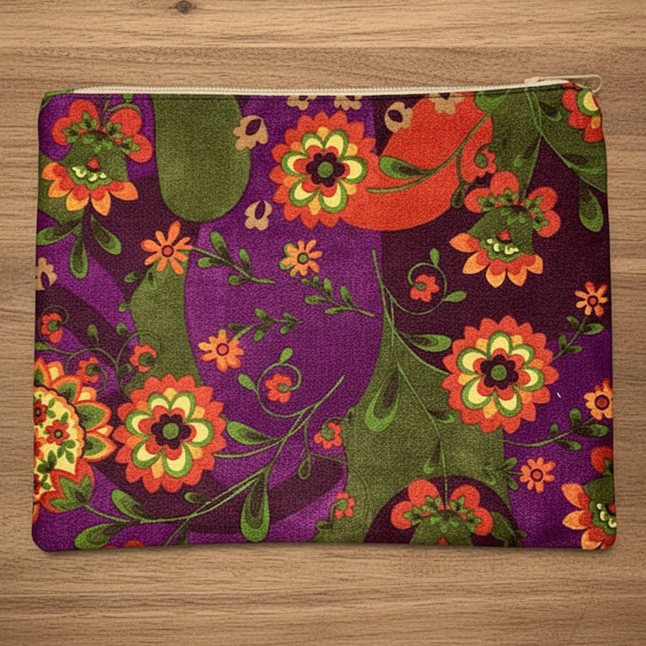 Floral patterned pouch with a purple background 