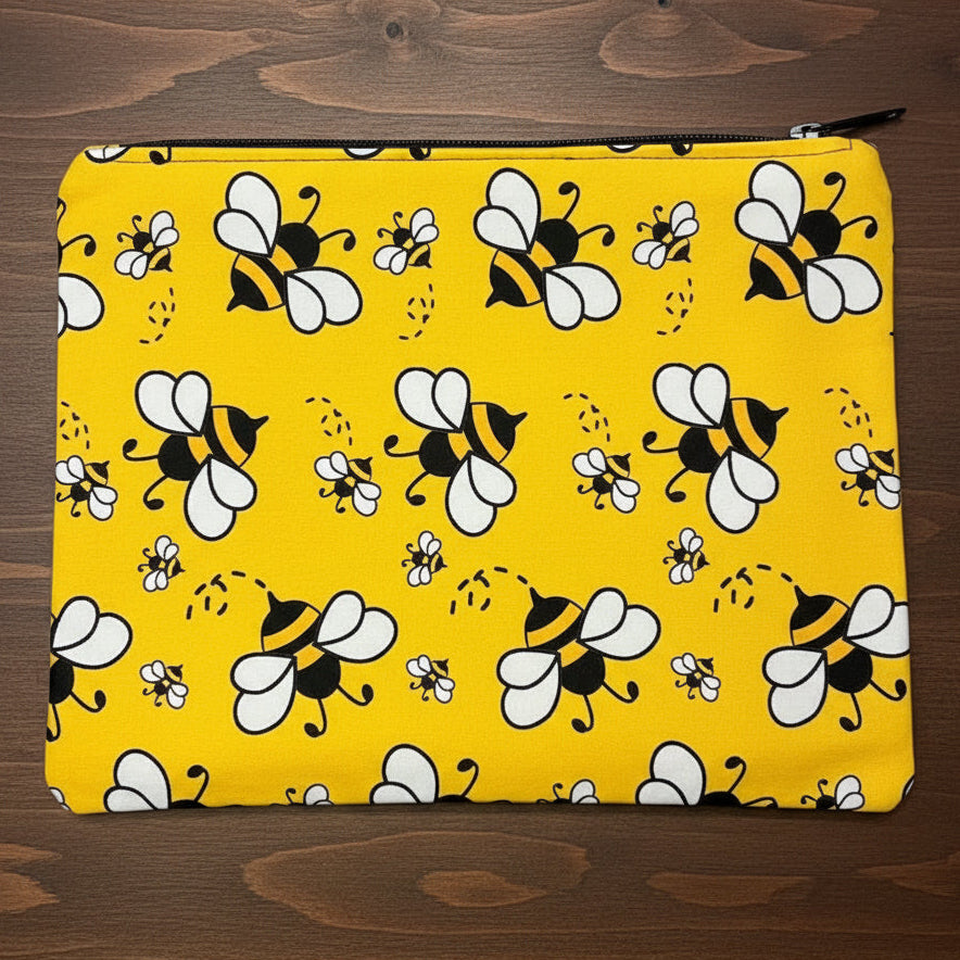 Yellow pouch with bee pattern 