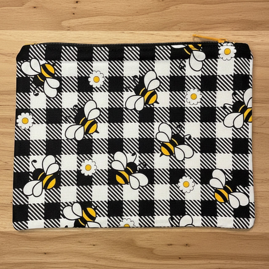 Pouch with bee and checkered pattern 