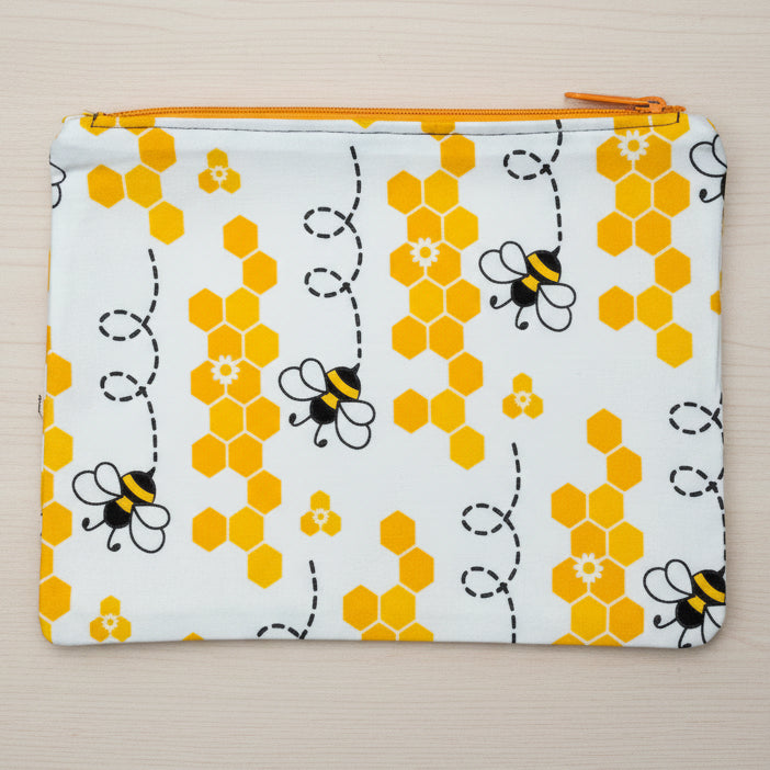 Fabric pouch with honeycomb and bee pattern 