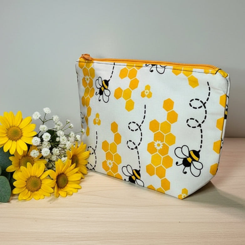 Small pouch with bee and honeycomb pattern