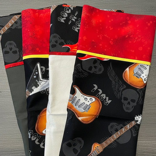 Three guitar-themed pillowcase with red, black, and white designs on a gray background.