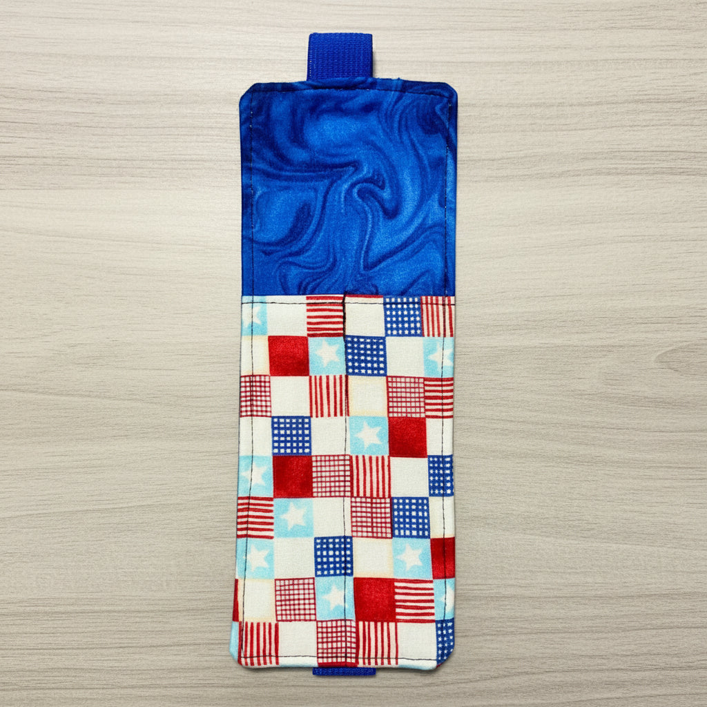 Phone case with blue marble top and red, white, and blue checkered bottom on a beige background