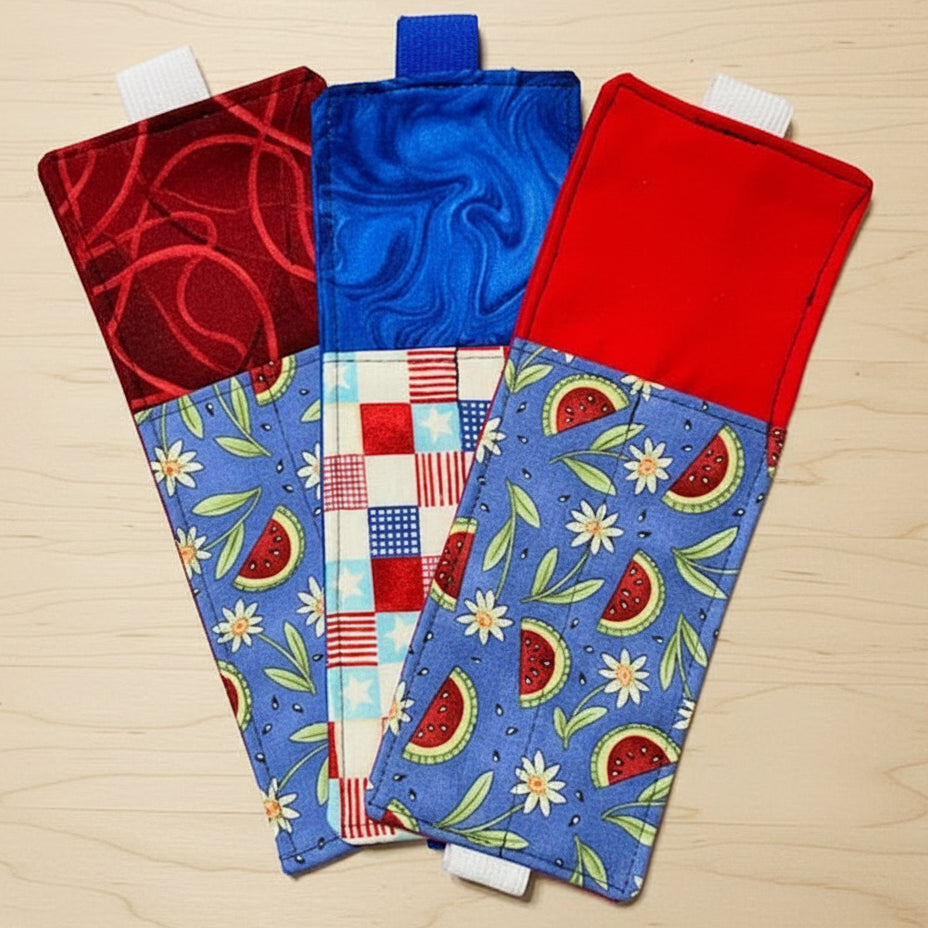 Four colorful fabric pouches with different patterns 