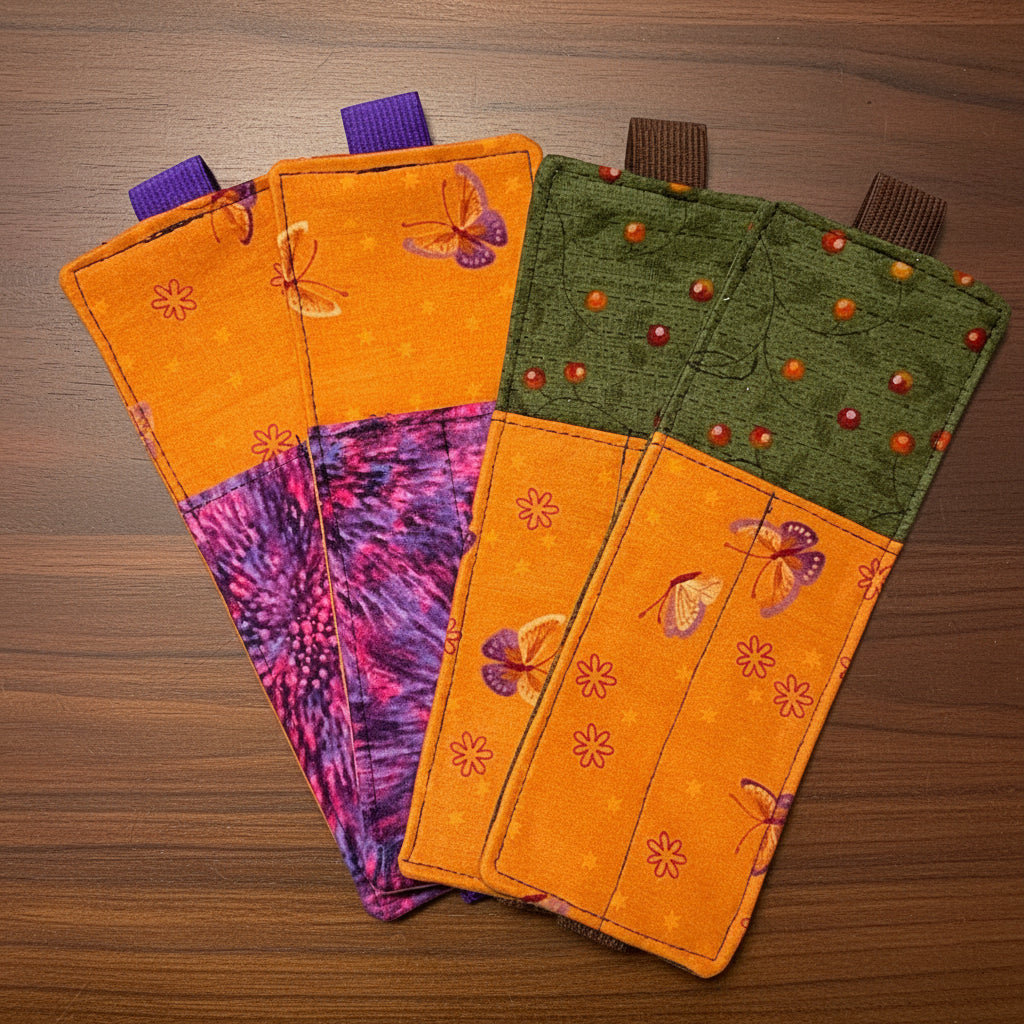 Set of four fabric bookmarks with colorful patterns 